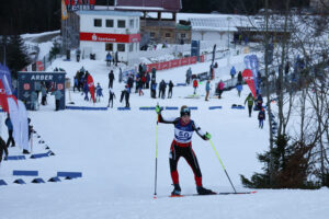 Biathlet beim Anstieg