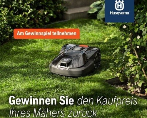 Bild von einem M&auml;hrroboter im Gras